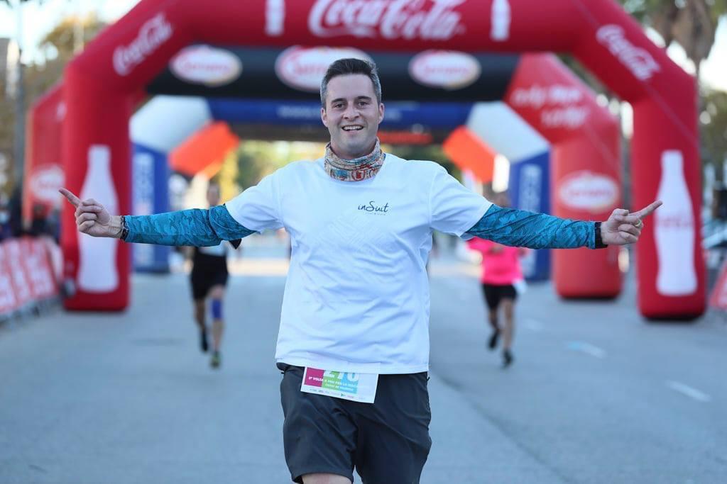 insuit's toni maizonada arrives at race finish line with open arms